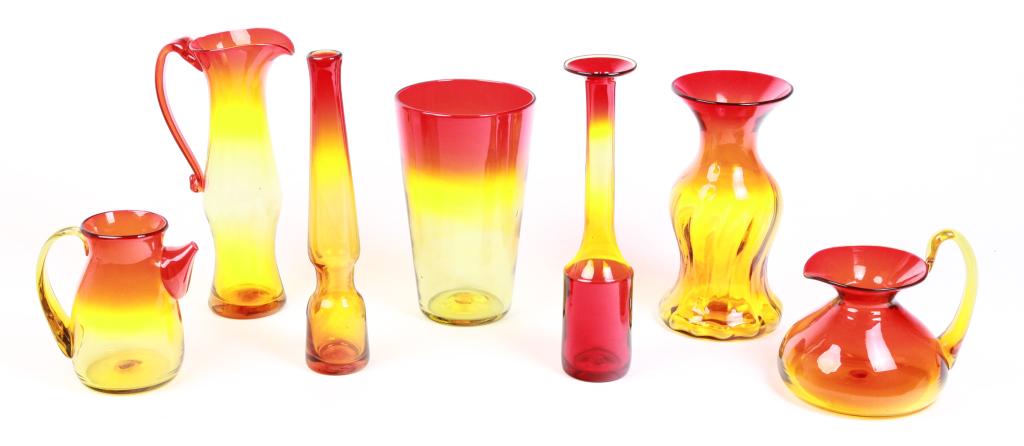 SEVEN PIECES OF AMERICAN GLASS, SOME BLENKO.: Second half 20th century. Two stick vases, 13.5"h., ewer, 12.5"h., swirled vase, 11"h., flip, 10"h., pitcher with applied handle, 7"h. And a squat ewer with applied handle, 7.25"h.