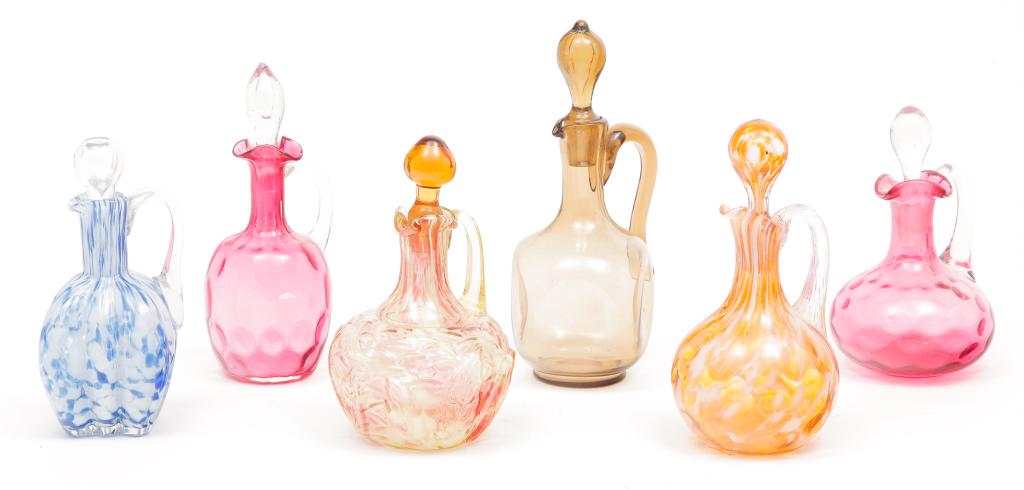 SIX AMERICAN COLORED GLASS CRUETS. (1 of 3)