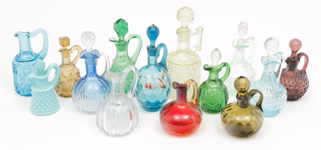 FOURTEEN ART AND PATTERN GLASS CRUETS. (1 of 5)