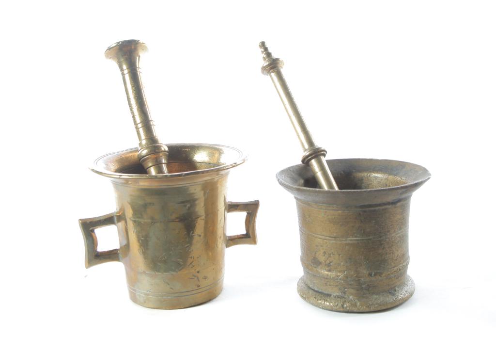 TWO EUROPEAN BRASS MORTARS AND PESTLES. (1 of 2)