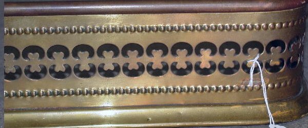TWO FIREPLACE ITEMS. Small brass fender - 2