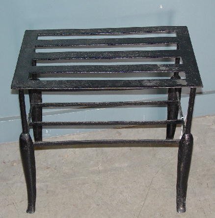 TWO FIREPLACE ITEMS. Small brass fender - 3