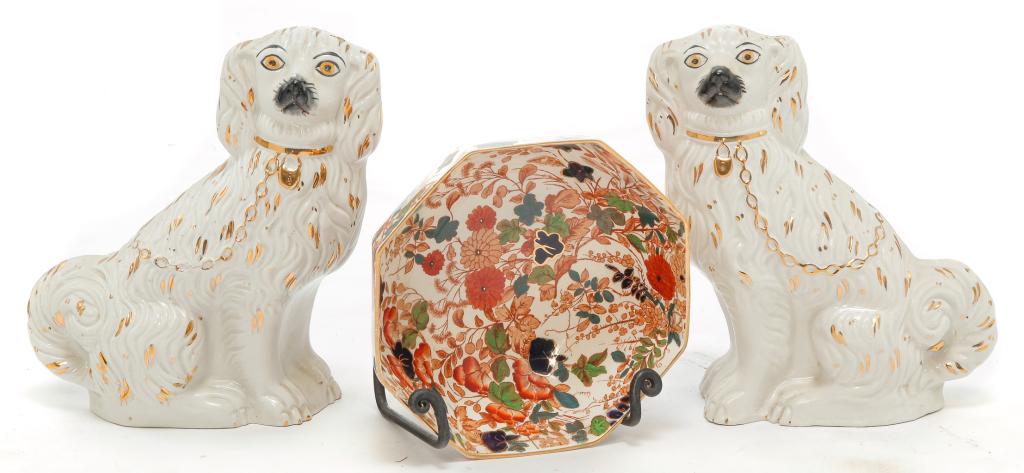 THREE PIECES OF ENGLISH EARTHENWARE.: Mid 20th century. A pair of "Kent" spaniels, white with gold trim, 9.5"h. And a Royal Couldon "Bittersweet" octagonal bowl, 3.5"h. 7.25"d.