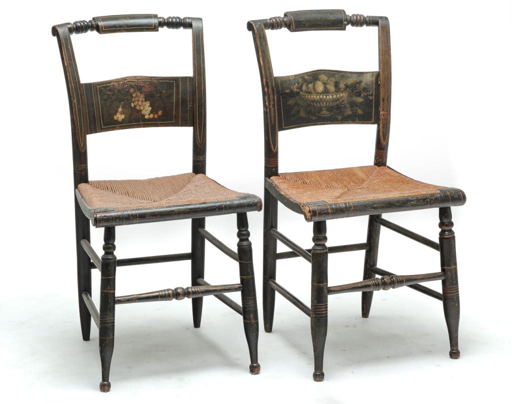 PAIR OF AMERICAN SHERATON DECORATED CHAIRS.: Second quarter 19th century, mixed woods. Pillow backs, worn black paint with floral decoration and yellow and gold pinstriping, rush seats. Edge loss and paint loss. 18" seat, 34.75"h.