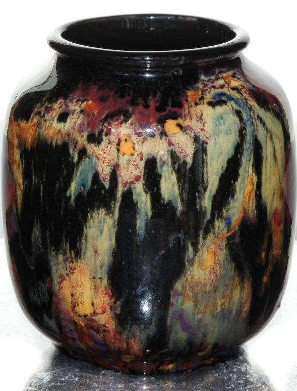 ROOKWOOD FIFTIETH ANNIVERSARY VASE BY E.T. HURLEY.: Dated 1930. Shape number 6194F with high glaze with malted colors of black, green, red, and yellow. Kiln mark with "50" and artist signature on bottom. Minor wear on table ring. 5"h.