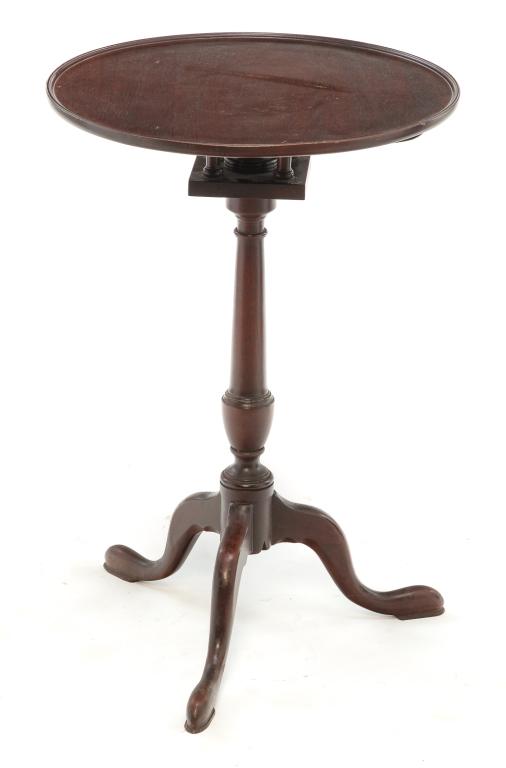 AMERICAN QUEEN ANNE TEA TABLE.: Second half 20th century, mahogany. Round dish top, tilt-top with birdcage, turned column and snake legs with pad feet. 29"h. 19.5"d.