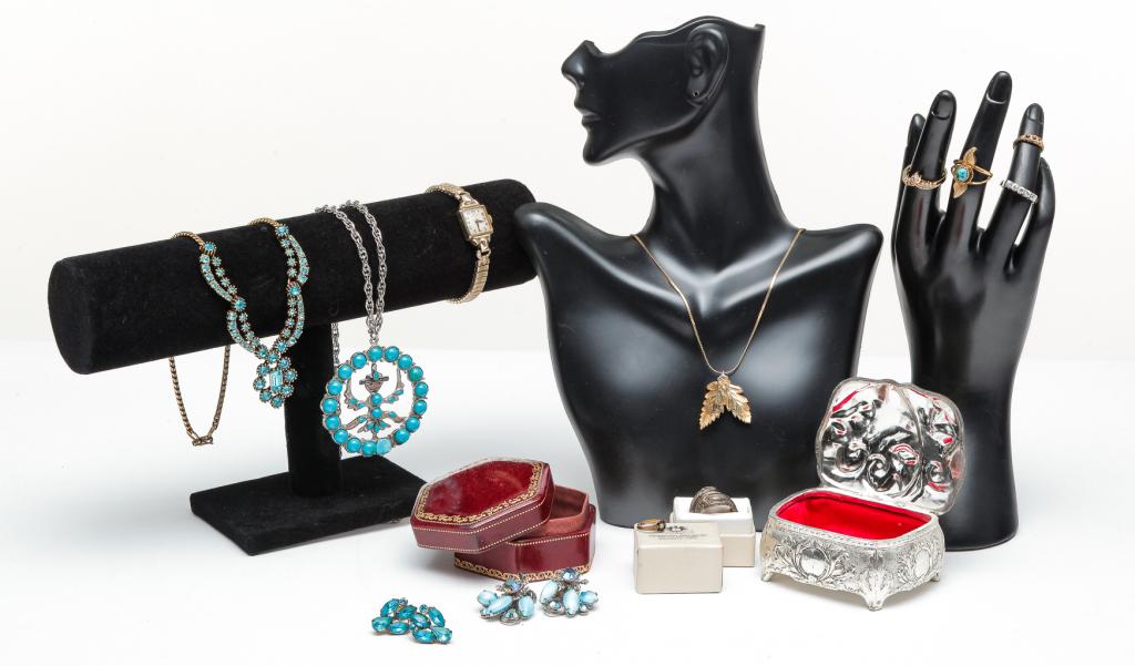 SMALL GROUP MOSTLY VINTAGE COSTUME JEWELRY.: American, 20th century. Eleven pieces of jewelry comprised of: ladies' gold filled Hamilton wristwatch, 17J; pair of BeauJewels rhinestone clip-on earrings; pair of blue rhinestone Coro earrings, scre