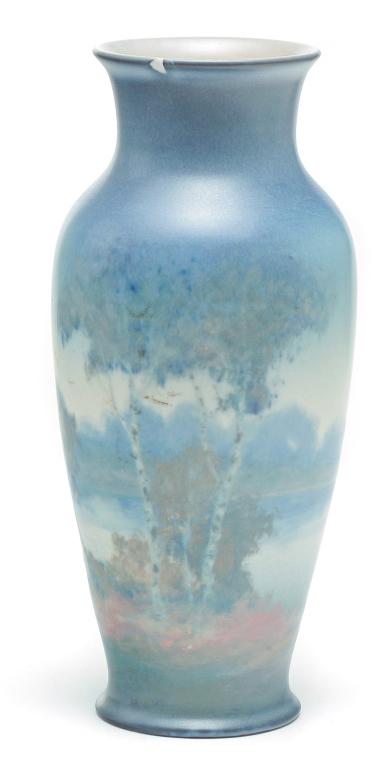 ROOKWOOD VELLUM VASE BY E.T. HURLEY.: Dated 1944. Shape number 6866 with scenic decoration. Scratches, glazed over rim chip, "x"ed and signed on bottom, with minor wear on table ring. 9"h.