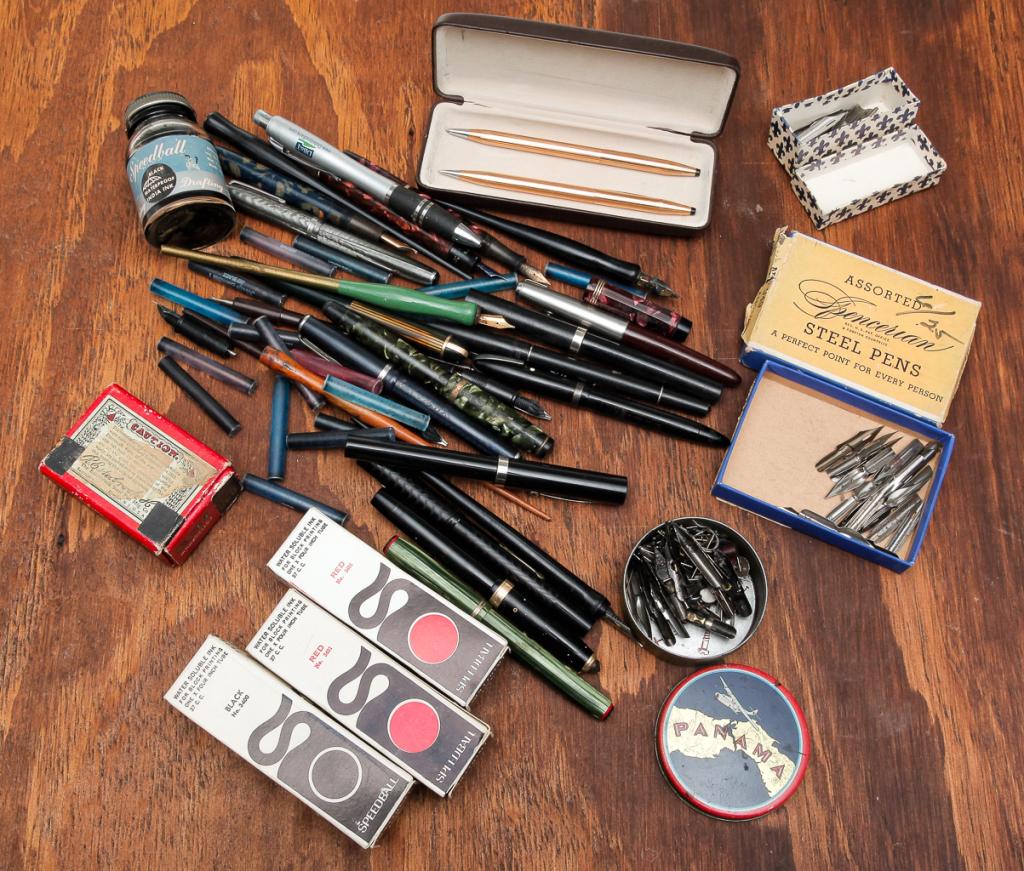 GROUP OF FOUNTAIN PENS AND RELATED ITEMS.: Twentieth century. Includes Waterman, Cross, calligraphy pen, Speedball ink, "Panama" steel nibs, ink cartridges etc.