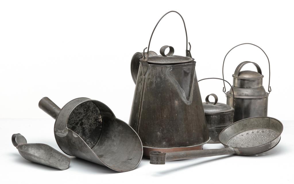 SIX PIECES OF AMERICAN KITCHEN TIN.: Late 19th century. Coffee pot: copper bottom and stove flange, 10.25"h. Bin scoop, 13"l. Canister scoop, 7.5"l. Skimmer, 15.25"l. Milk pail with wire bale handle, 7.5"h. And lidded pail with wire bale