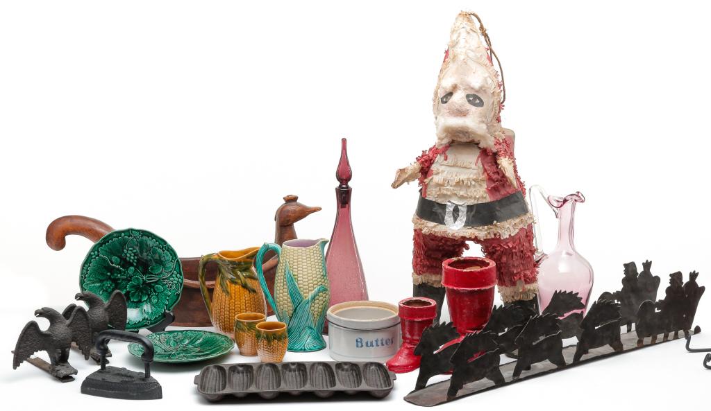 ECLECTIC GROUP LOT.: Nineteenth-20th century. Cast iron snow birds, sad irons and corn mold, contemporary majolica corn pitcher and four cups, majolica leaf plates and corn pitcher, two contemporary decanters, group of st