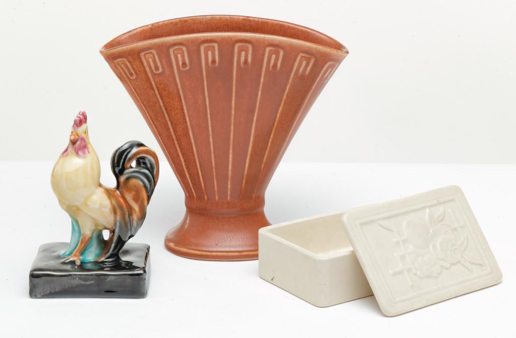 THREE ROOKWOOD ART POTTERY PIECES.: Three pieces: a 1943 Charles McLaughlin rooster, shape number 6030 in multi-colored high glaze, 5"h; a 1928 orange matte fan vase, shape number 2937, 7"h; Together with a 1936 white vellum cigarette b