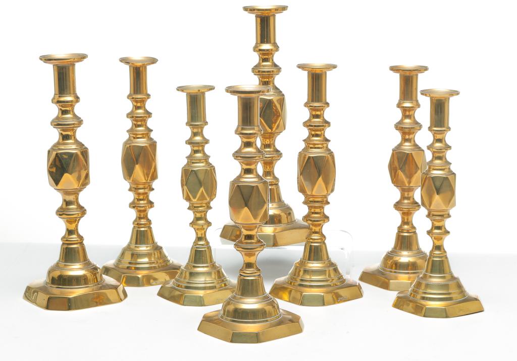 FOUR PAIRS OF ENGLISH "DIAMOND" CANDLESTICKS.: Fourth quarter 19th century, brass. "King of Diamonds", 12.5"h., "The Diamond Prince", 12"h., "The Queen of Diamonds", 11.5"h. and "The Diamond Princess", 11"h. With push ups.