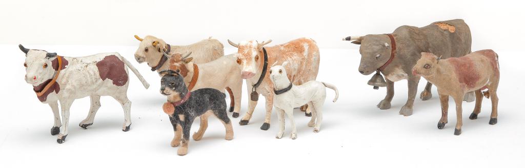 GROUP OF SMALL COW AND DOG TOYS.: American, Japanese and European, 20th century. Includes flocked, hide and papier mÃ¢chÃ© with original paint. One later bull marked "Japan". Varying wear and some loss. 2.5" to 3"h.
