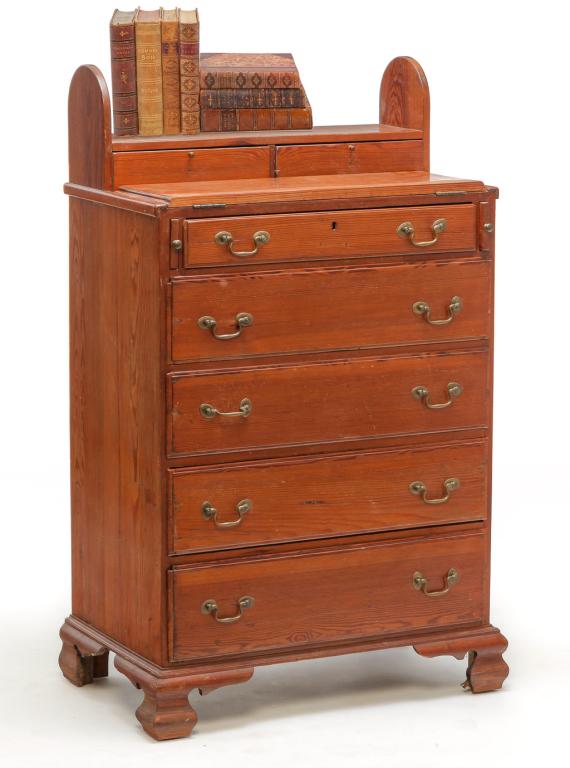AMERICAN CHIPPENDALE STYLE BUTLERS' DESK.: Pine, made from old parts and wood. Book shelf top with rounded ends over two dovetailed drawers, solid ends and ogee bracket feet. Refinished with some edge damage and repairs to feet. 40"h. 30"w. 18
