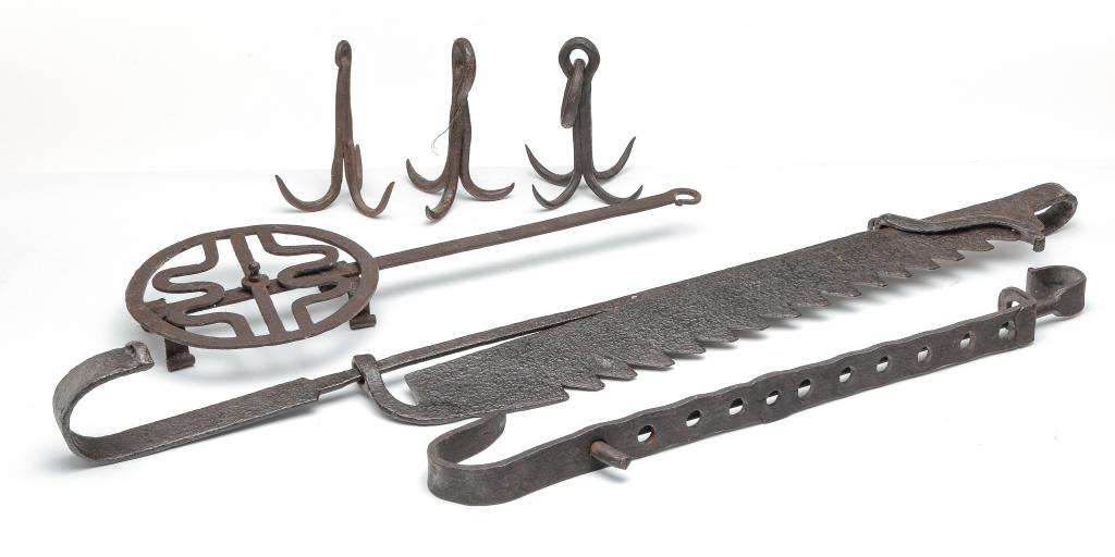 SIX PIECES OF AMERICAN FORGED IRON.: Nineteenth century. Sawtooth trammel, 38.5"h. Hole and rod trammel, 28.5"h. Round broiler, 22"l. And three hooks: two treble, 7"h. and 6.75"h., and one quadruple with ring, 9"h.