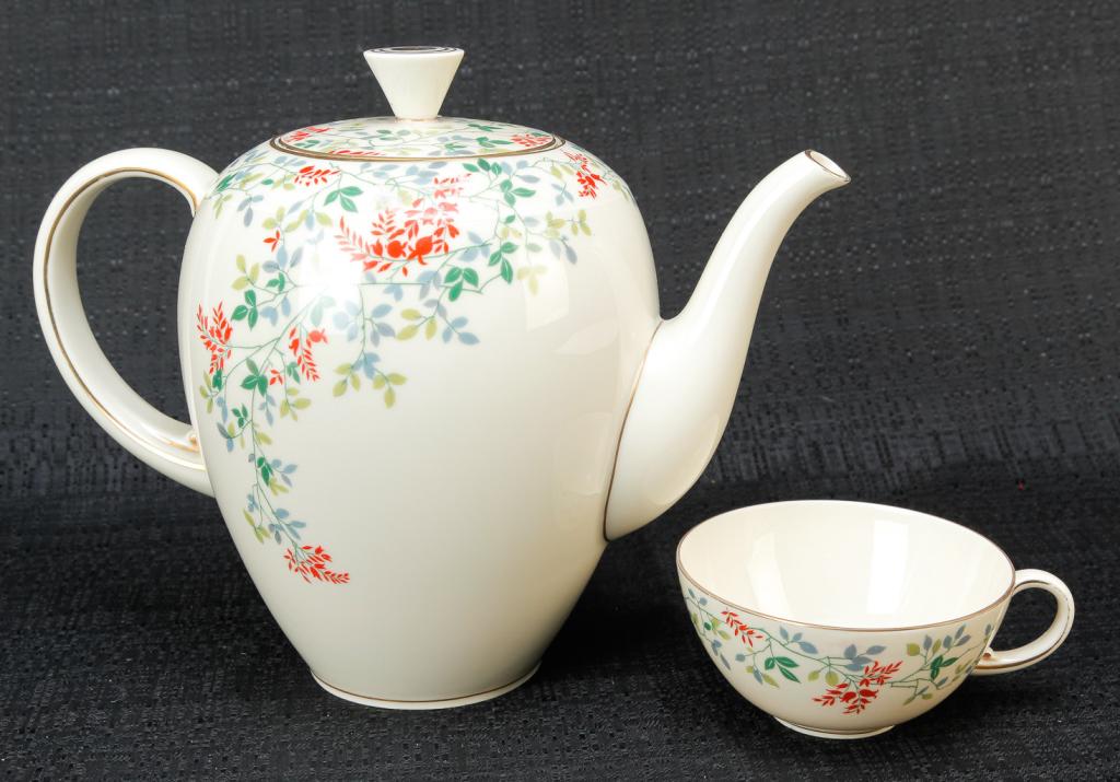 GERMAN ROYAL TETTAU DESSERT SET.: Mid 20th century. Pattern "ROT284 (gold trim)". Red flowers with green foliage on ivory china. Two coffee pots, 7.25"h., teapot, 5.5"h. creamer, sugar, ten dessert plates, ten cups, nine saucers and c