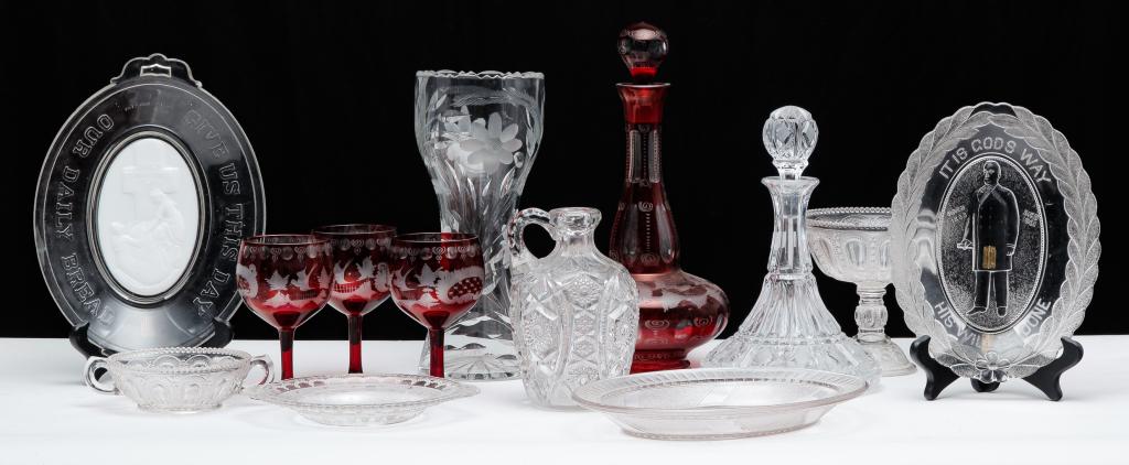 GROUP OF GLASS.: Twentieth century. Includes Bohemian decanter and goblets, tall cut glass vases, captains decanter, sack vase and assorted pattern glass.