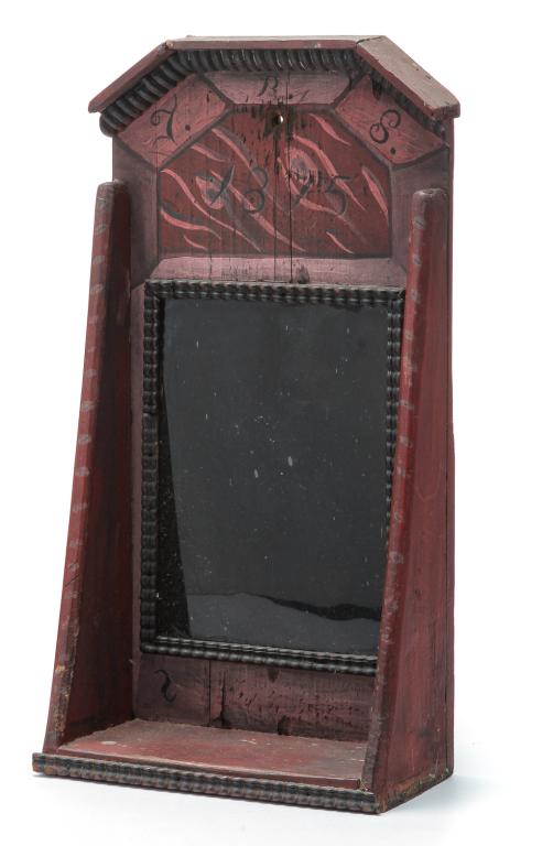 AMERICAN PAINT DECORATED FANTASY PIECE.: Twentieth century. Hanging mirrored back candle shelf, made from old pine boards with square nail construction, canted sides, applied moldings, and red, pink, lilac and black paint. Dated 1875. 17"h. 