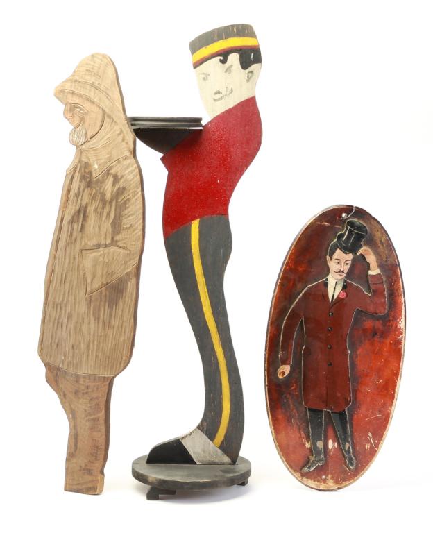 THREE PIECES INCLUDING BELL BOY TRAY.: American, 1st half 20th century. Wooden cut outs. Bell boy ashtray stand with original paint and alligatored surface, 37"h., tailor's sign with gentleman in overcoat. Original paint, 23.25"h. and roug