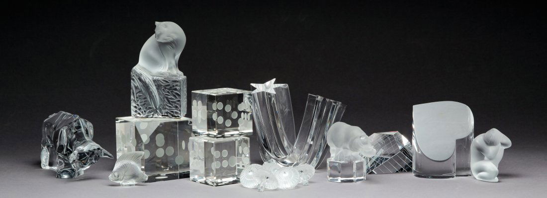 GROUP OF CRYSTAL INCLUDING HOYA AND LALIQUE.: Second half 20th century, some signed. "Lalique" nude, cat, fish and partial stopper set in box, three unsigned dice, "Baccarat" bull, "Goebel" hippo, "Steuben" star, "Hoya" abstract and an unsigned a