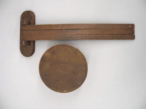 TWO WOODEN ITEMS IN ORIGINAL MELLOW BROWN SURFACE.: TWO WOODEN ITEMS IN ORIGINAL MELLOW BROWN SURFACE. Bentwood pantry box with steel tacks and wooden peg construction. 6 3/4"d. 2 3/4"h. Shaker drying or herb rack with three hinged tines. The oval wall