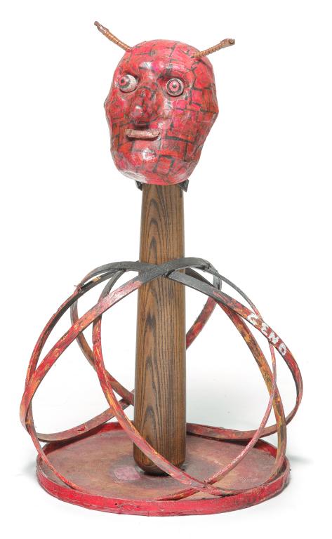 "BAT OUT OF HELL" BY GENO SHIRRIN.: American, 2nd half-20th century, paper label and signed. Found objects with devil mask on baseball bat. 21"h.