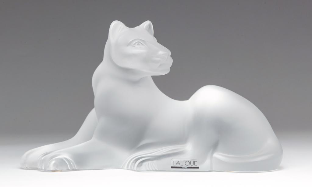 FRENCH "LALIQUE" GLASS LIONESS.: Second half-20th century. Reclining lioness with sticker label, "Lalique, Paris". 5.5"h. 9.5"l.
