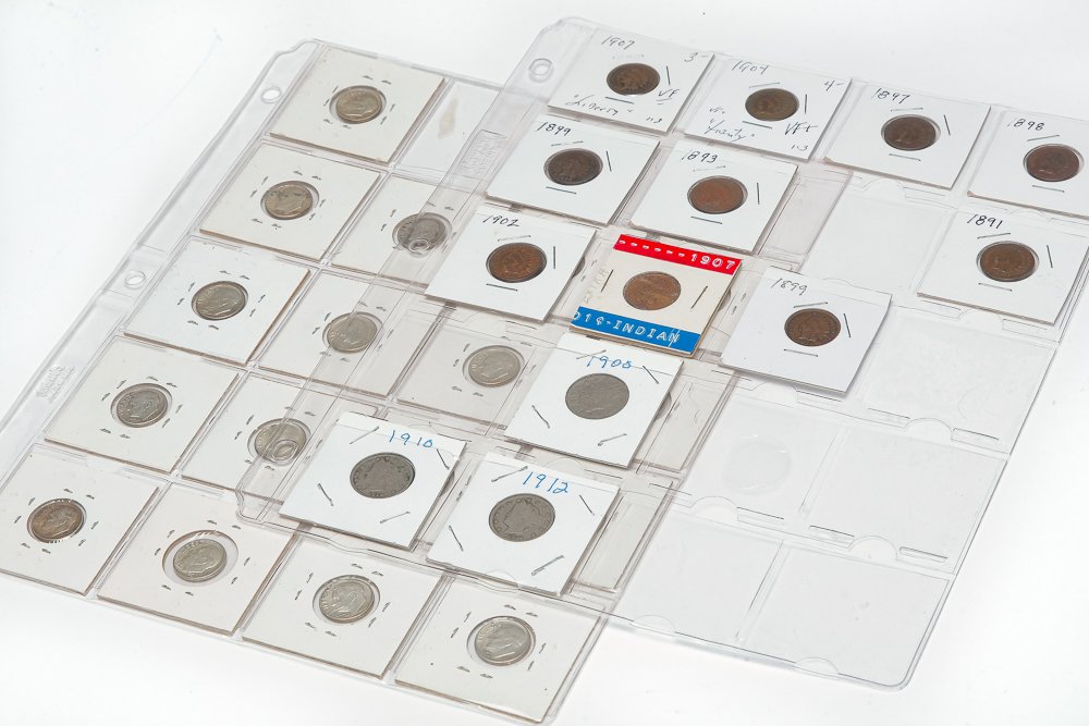 GROUP OF AMERICAN COINS INCLUDING SILVER: Group of American coins including seventeen Roosevelt silver dimes, ten Indian head cents, and three Liberty head nickels.