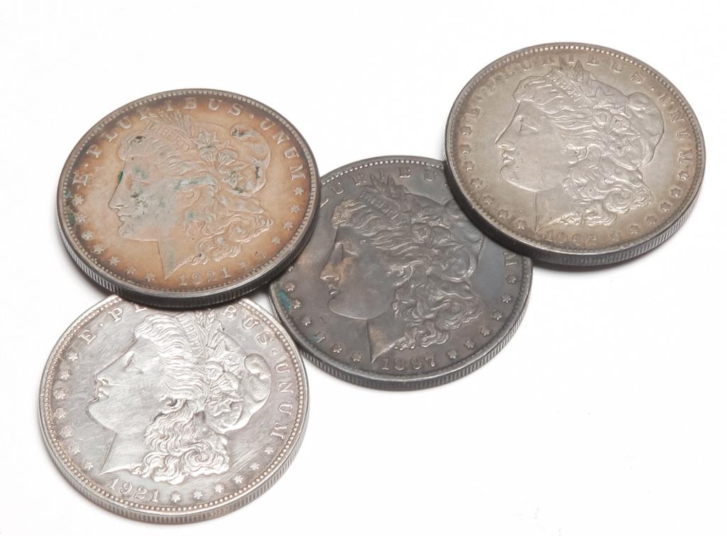 FOUR MORGAN SILVER DOLLARS (1 of 2)