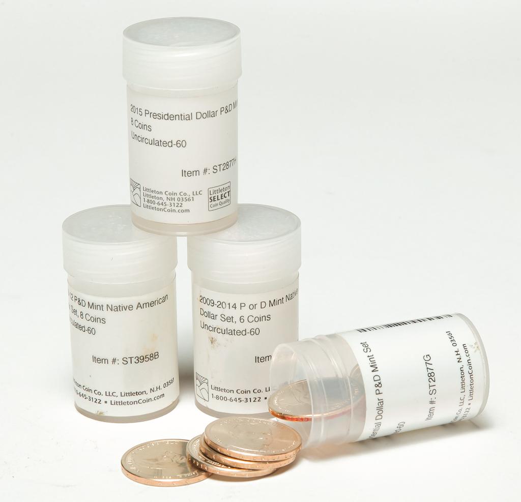 FOUR TUBES OF UNCIRCULATED DOLLAR COINS (1 of 3)