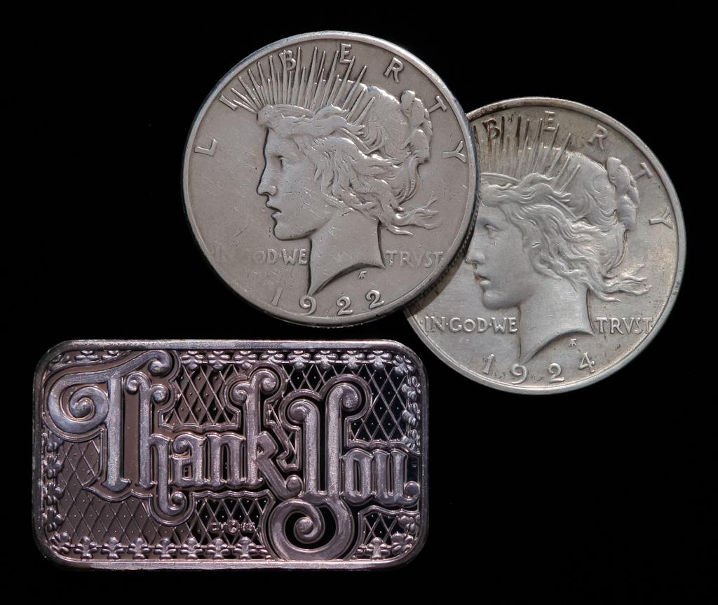 TWO PEACE DOLLARS AND A STERLING SILVER BAR (1 of 2)