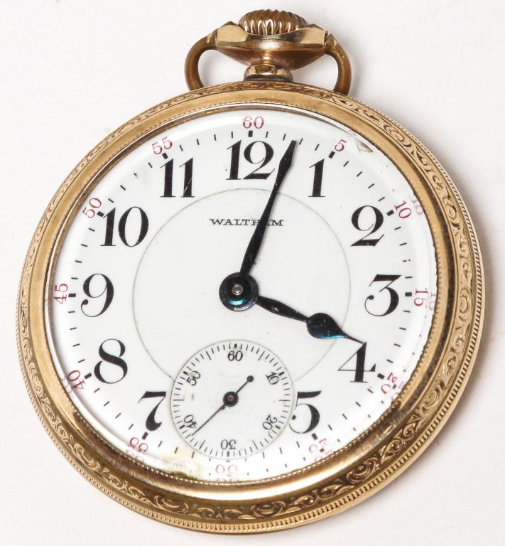 AMERICAN WALTHAM TWENTY-ONE JEWEL POCKET WATCH.: First quarter 20th century. Open face, 1019 gold filled case, railroad lever set and 12 size.