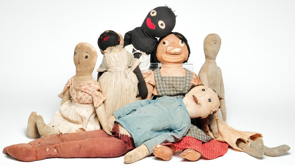 SIX AMERICAN STUFFED CLOTH DOLLS. (1 of 1)