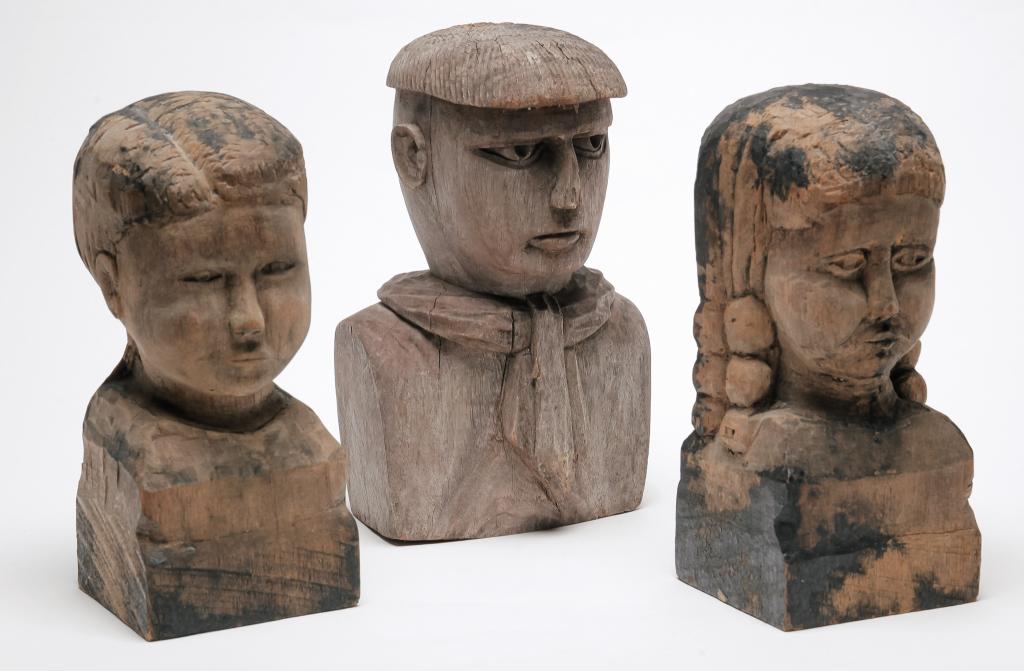 THREE CARVED FOLKSY BUSTS. (1 of 3)