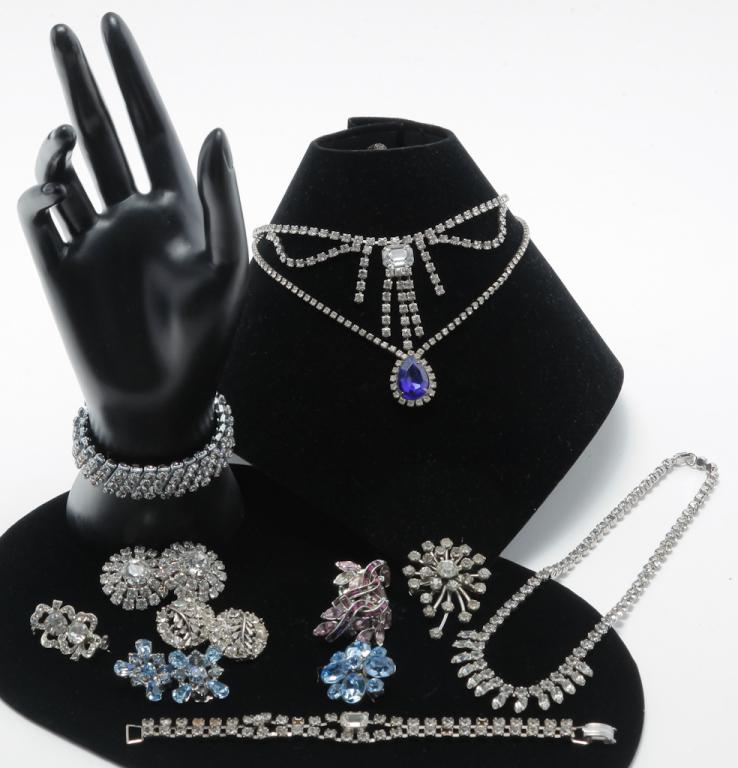 VINTAGE AND NEWER RHINESTONE JEWELRY.: Mid-late 20th century. Group of silver tone rhinestone jewelry consisting of: 4-piece parure by Parco with original box (pin stem missing, several small stones missing), four pairs of earrings (one We