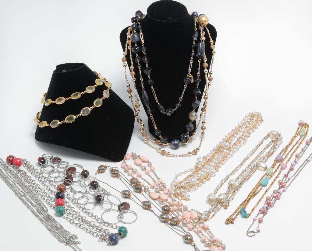 VINTAGE LONG COSTUME NECKLACES.: Mid-late 20th century. Group of fourteen longer necklaces, many can be doubled or tripled, most with stones or other embellishments. One signed Coro, one hand made in Italy. Very versatile group.