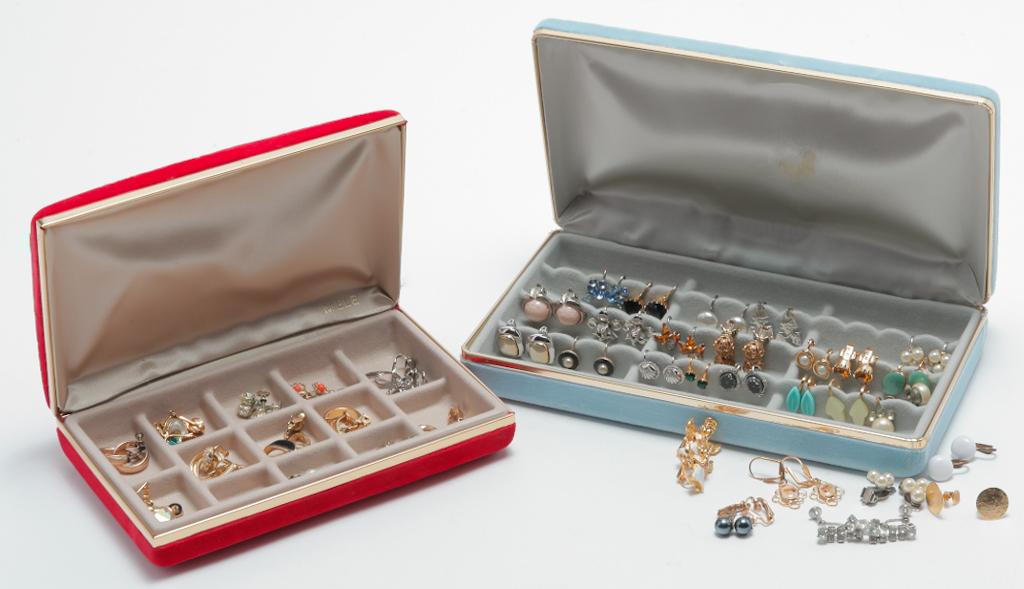 SIXTY PAIRS OF SMALLER VINTAGE EARRINGS.: Mid-late 20th century. Two cases filled with smaller scale earrings including pieces by Trifari, Monet, and Sarah Cov.
