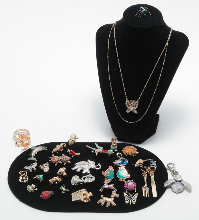 WHIMSICAL VINTAGE AND NEWER JEWELRY.: Mid-20th â€“ early 21st century. Small group of animal, insect, bird and other jewelry; comprised of one rhinestone butterfly necklace, one keychain â€“ scarab motif that opens to a watch, o