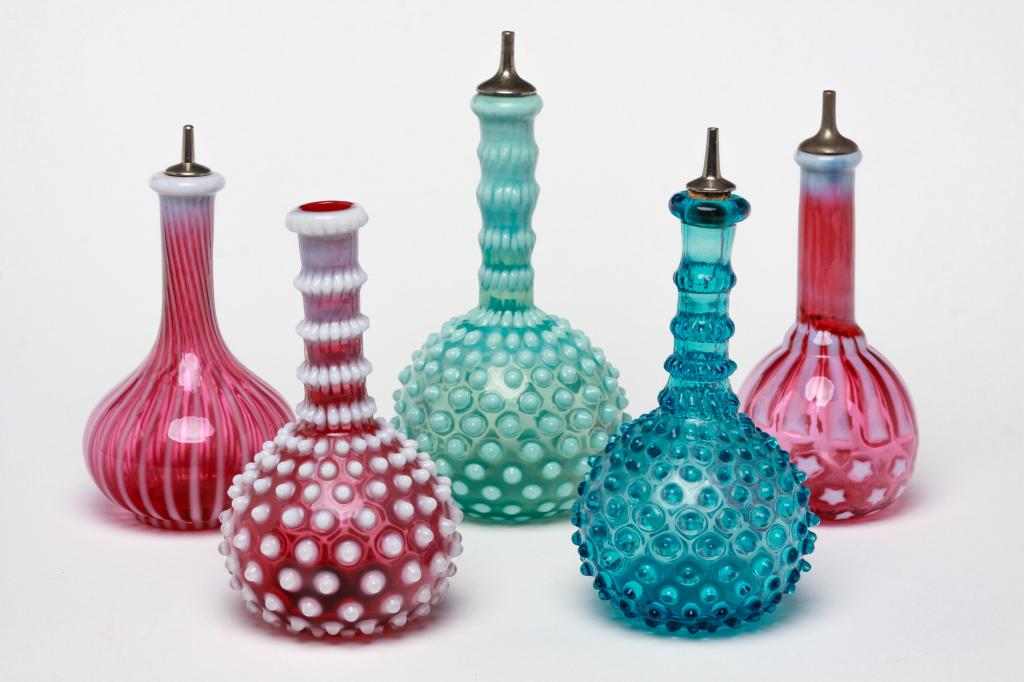 FIVE AMERICAN ART GLASS BARBER BOTTLES. (1 of 1)