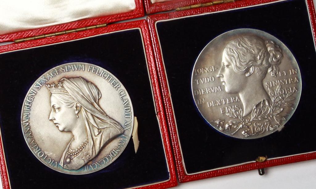 A PAIR OF QUEEN VICTORIA MEDALLIONS. (1 of 1)