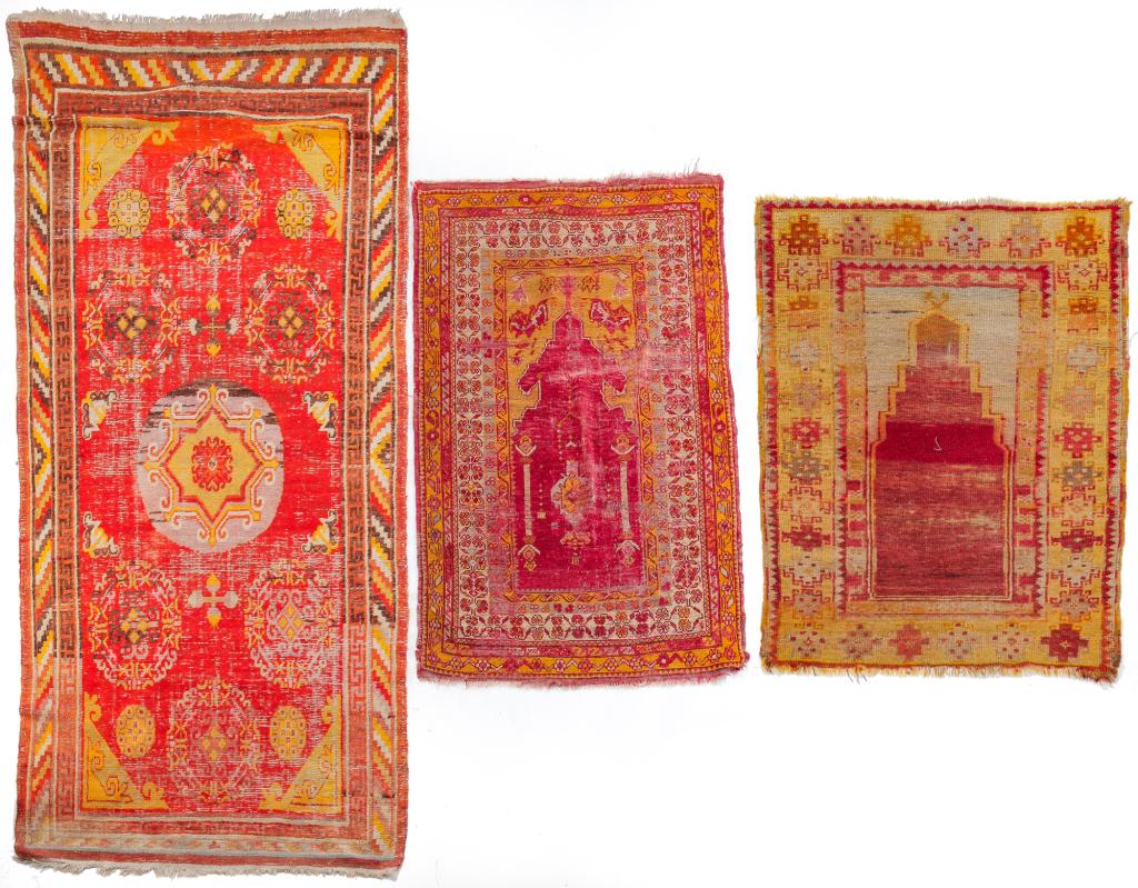 THREE ORIENTAL AREA RUGS. (1 of 4)