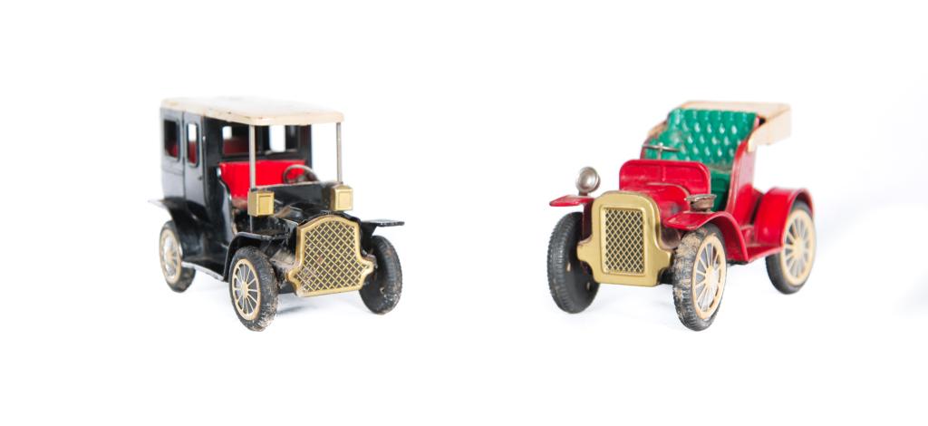 TWO WIND UP TOY CARS. (1 of 3)