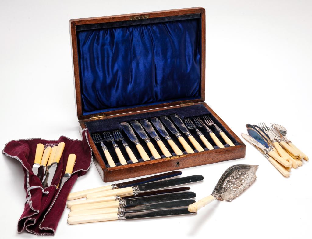 GROUP OF BONE AND CELLULOID HANDLE PIECES.: 19th and 20th centuries. Lewis Brown fish server, two fish sets, two sets of dinner knives and a fish set in a fitted oak box.