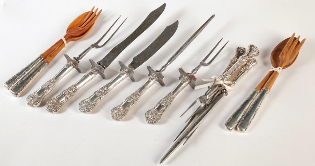 ELEVEN AMERICAN HOLLOW HANDLED PIECES.: 19th and 20th centuries. Two salad sets and three carving sets.