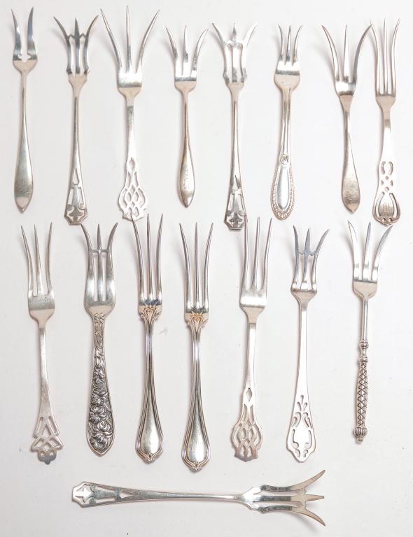 FIFTEEN AMERICAN STRAWBERRY FORKS.: 20th century. Including Lunt, Towle, Whiting and others. Approx 4 ozt.