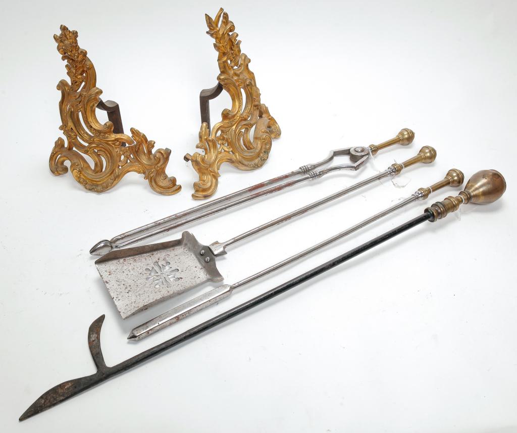 SIX PIECES OF FIREPLACE ACCOUTREMENT.: Nineteenth century. A pair of French brass fire gilded leaf bracket and irons. 12"h and four fireplace tools, poker 28"h, shovel 28"h, tongs 28"h and harpoon poker 36"h.