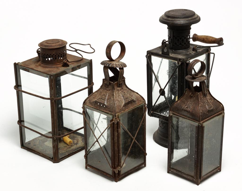 FOUR AMERICAN TIN CANDLE LANTERNS. (1 of 1)