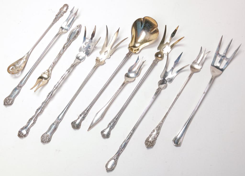ELEVEN AMERICAN STERLING SERVICE PIECES. (1 of 1)