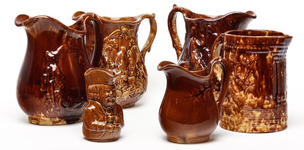 SIX ENGLISH ROCKINGHAM PITCHERS. (1 of 1)